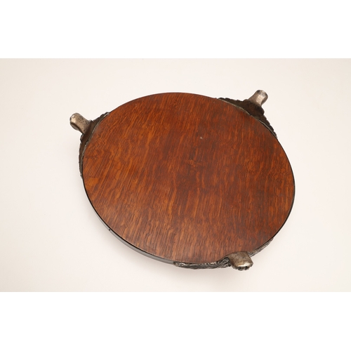 67 - A LATE VICTORIAN / EARLY EDWARDIAN SILVER MIRRORED CAKE STAND. Of circular form, the silver frame wi... 