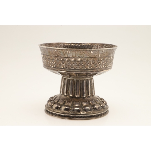 71 - AN EDWARDIAN SILVER REPRODUCTION OF THE TUDOR HOLMS CUP. Of font shape with a raised and chased circ... 