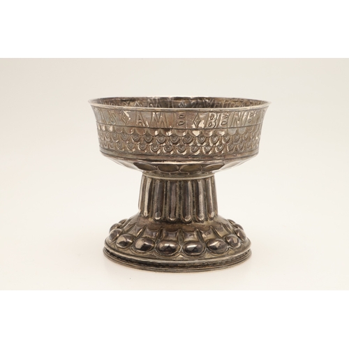 71 - AN EDWARDIAN SILVER REPRODUCTION OF THE TUDOR HOLMS CUP. Of font shape with a raised and chased circ... 