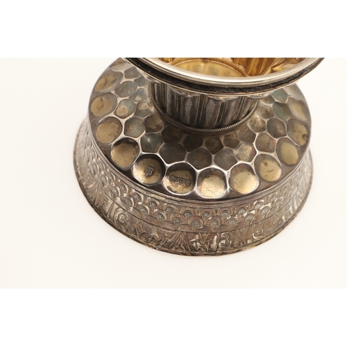 71 - AN EDWARDIAN SILVER REPRODUCTION OF THE TUDOR HOLMS CUP. Of font shape with a raised and chased circ... 