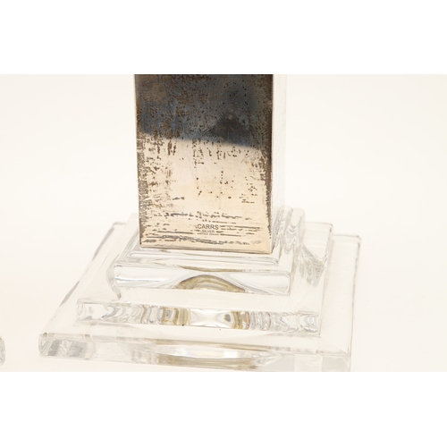76 - A PAIR OF CARR'S OF SHEFFIELD GLASS AND SILVER FACED CANDLESTICKS AND A SILVER CANDLE STAND. The pai... 