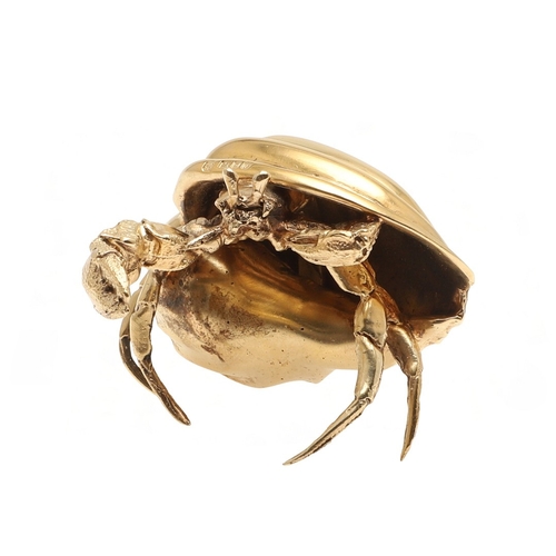 77 - A SILVER GILT HERMIT CRAB. Modelled with a shell resting on its back. 
Hallmarked Meiling & Gartrell... 