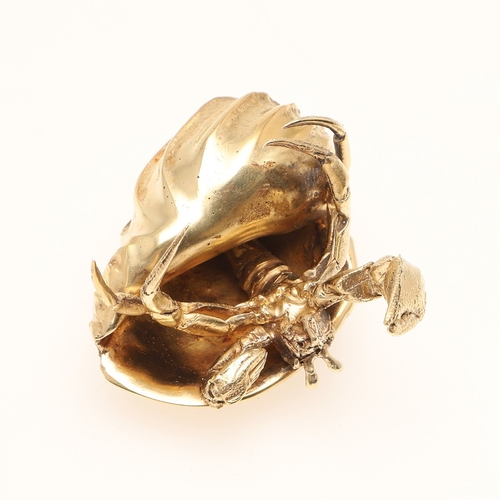 77 - A SILVER GILT HERMIT CRAB. Modelled with a shell resting on its back. 
Hallmarked Meiling & Gartrell... 