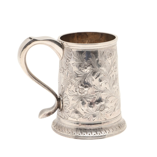82 - A GEORGE III SILVER MUG. With later chased foliate and flower head decoration, hallmarked John Langl... 