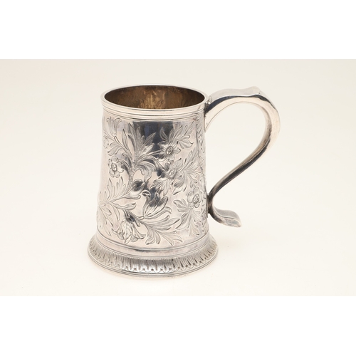 82 - A GEORGE III SILVER MUG. With later chased foliate and flower head decoration, hallmarked John Langl... 