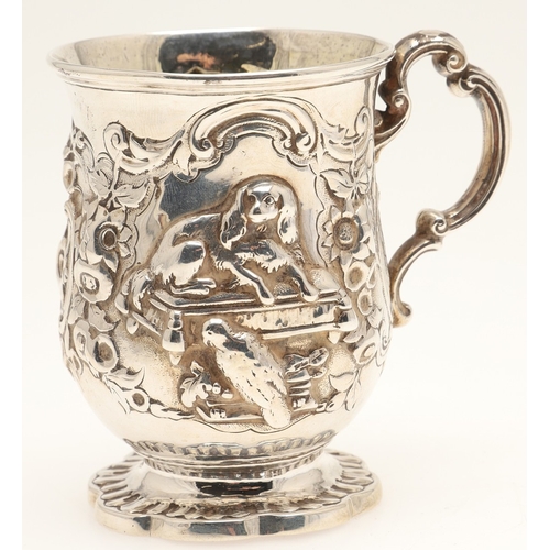 84 - A VICTORIAN SILVER ROCOCO DECORATED CHRISTENING MUG. Of baluster form, with floral and c-scroll deco... 