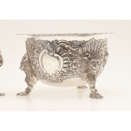 86 - A VICTORIAN GEORGE II STYLE IRISH SILVER CREAM JUG AND SUGAR BOWL. The jug and sugar bowl both with ... 