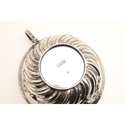 87 - A LATE VICTORIAN SILVER PORRINGER AND COVER. With demi-fluted and foliate swag decoration, plain scr... 