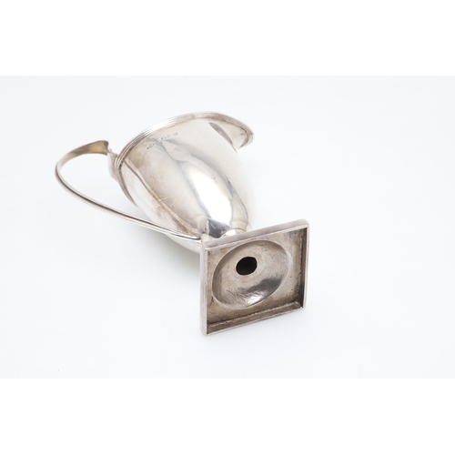 88 - A VICTORIAN SILVER HELMET JUG. On a square foot, hallmarked Florence Warden, Chester, 1895. Height 1... 