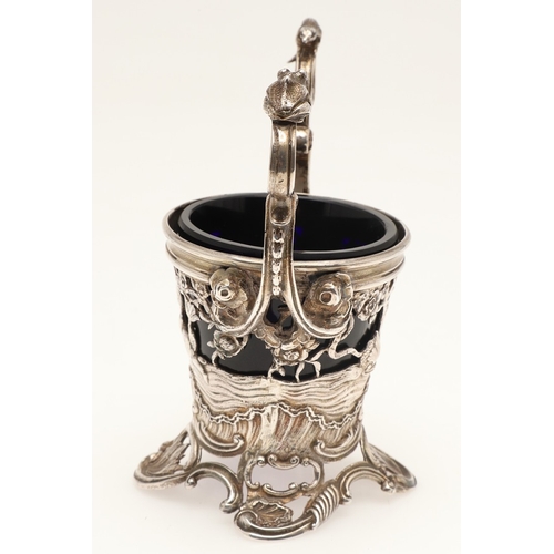 90 - AN EDWARDIAN SILVER TWIN-HANDLED CREAM PAIL BY WILLIAM COMYNS. In the rococo taste, the twin flying ... 