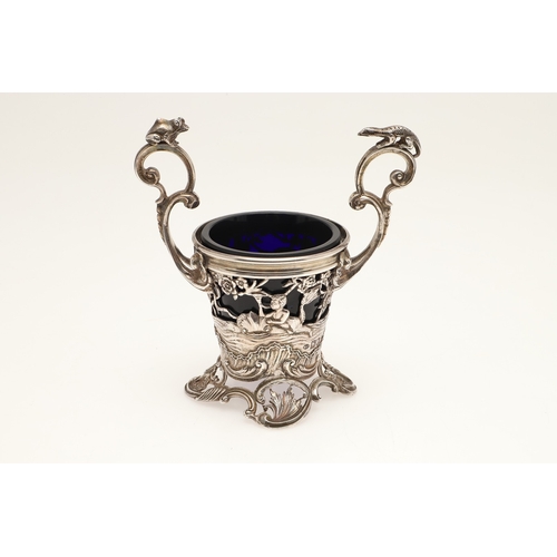 90 - AN EDWARDIAN SILVER TWIN-HANDLED CREAM PAIL BY WILLIAM COMYNS. In the rococo taste, the twin flying ... 