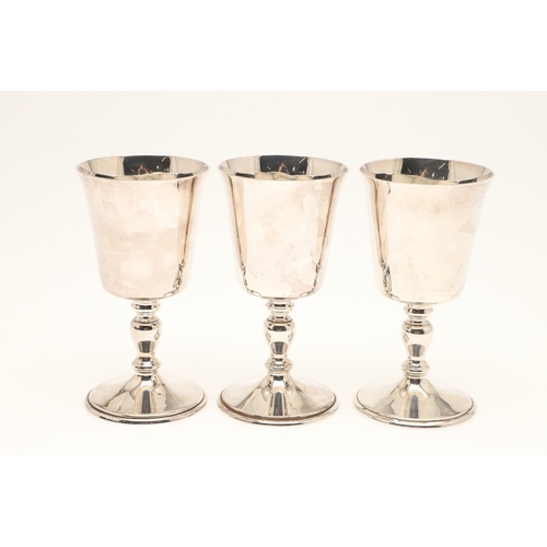 92 - A SET OF THREE BOXED QUEEN ELIZABETH II SILVER JUBILEE GOBLETS. Engraved with 'Royal Silver Jubilee ... 