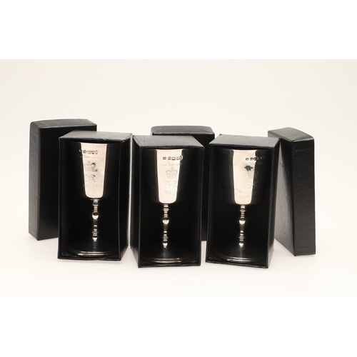 92 - A SET OF THREE BOXED QUEEN ELIZABETH II SILVER JUBILEE GOBLETS. Engraved with 'Royal Silver Jubilee ... 