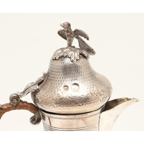 96 - A TURKISH SILVER COFFEE POT. Of baluster form, engine turned and engraved decoration, the hinged top... 