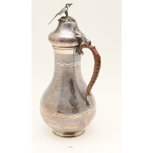 96 - A TURKISH SILVER COFFEE POT. Of baluster form, engine turned and engraved decoration, the hinged top... 