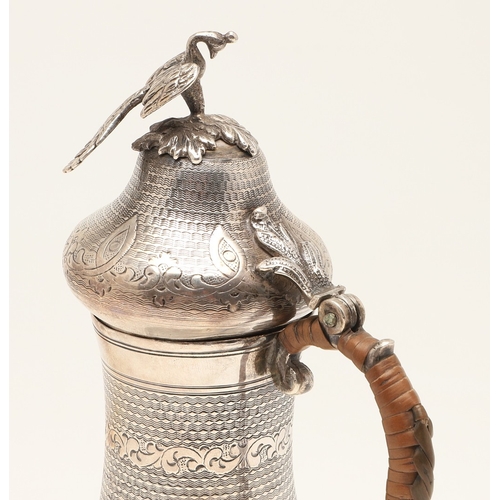 96 - A TURKISH SILVER COFFEE POT. Of baluster form, engine turned and engraved decoration, the hinged top... 