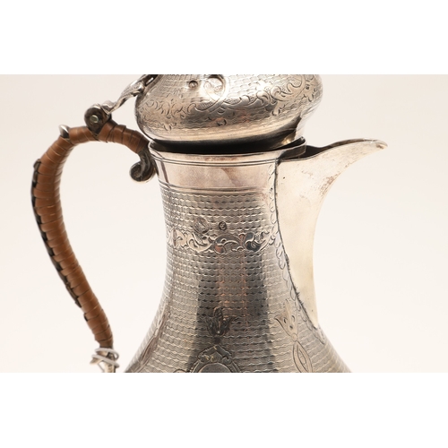 96 - A TURKISH SILVER COFFEE POT. Of baluster form, engine turned and engraved decoration, the hinged top... 