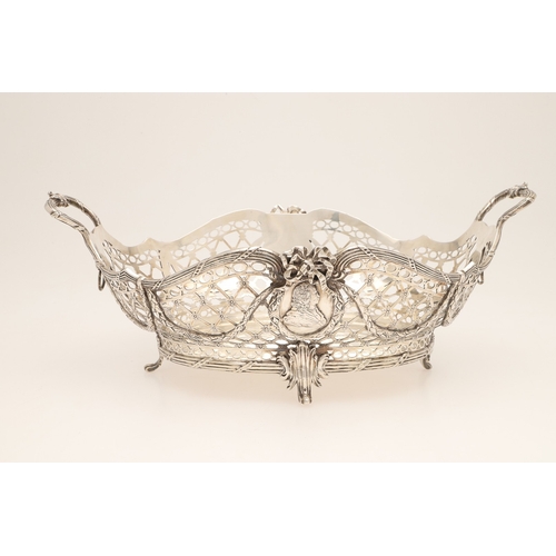 97 - A 19TH CENTURY DUTCH SILVER TWIN HANDLED BREAD BASKET. Of shaped oval form in the Louis Seize style,... 