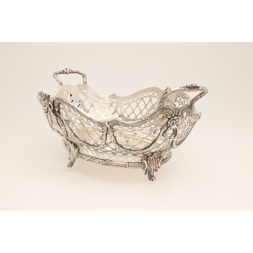 97 - A 19TH CENTURY DUTCH SILVER TWIN HANDLED BREAD BASKET. Of shaped oval form in the Louis Seize style,... 