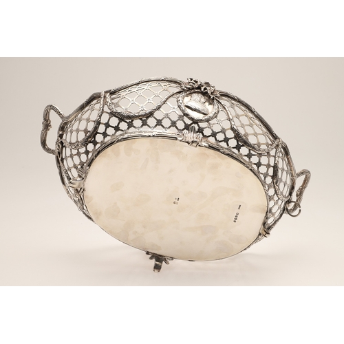 97 - A 19TH CENTURY DUTCH SILVER TWIN HANDLED BREAD BASKET. Of shaped oval form in the Louis Seize style,... 