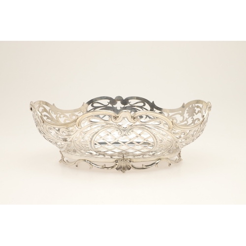 98 - A DUTCH SILVER BREAD BASKET. Of shaped oval form, decorated with pierced foliate scrolls and lattice... 