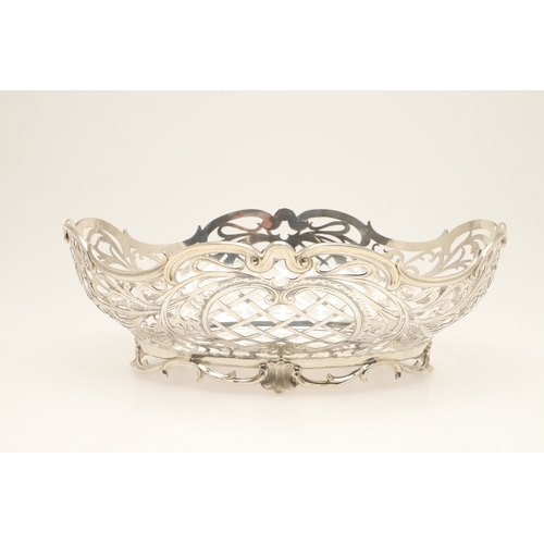 98 - A DUTCH SILVER BREAD BASKET. Of shaped oval form, decorated with pierced foliate scrolls and lattice... 
