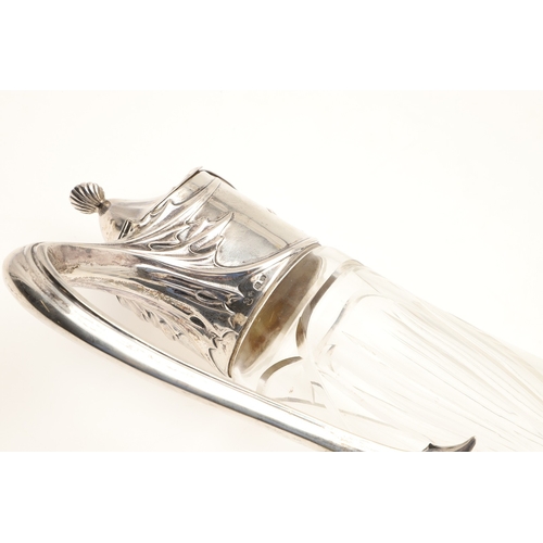 99 - A LATE 19TH CENTURY ARTS AND CRAFTS GERMAN SILVER MOUNTED GLASS CLARET JUG. An Arts and Crafts clare... 