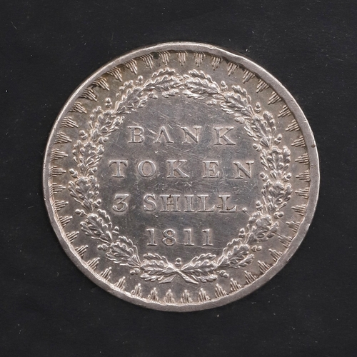 A GEORGE III THREE SHILLING BANK TOKEN, 1811. George III Bank of ...