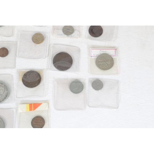A LARGE COLLECTION OF ASSORTED WORLD COINS. A large collection of world ...