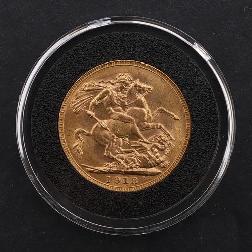 A GEORGE V SOVEREIGN, 1918. A George V Sovereign, bare head l. reverse ...