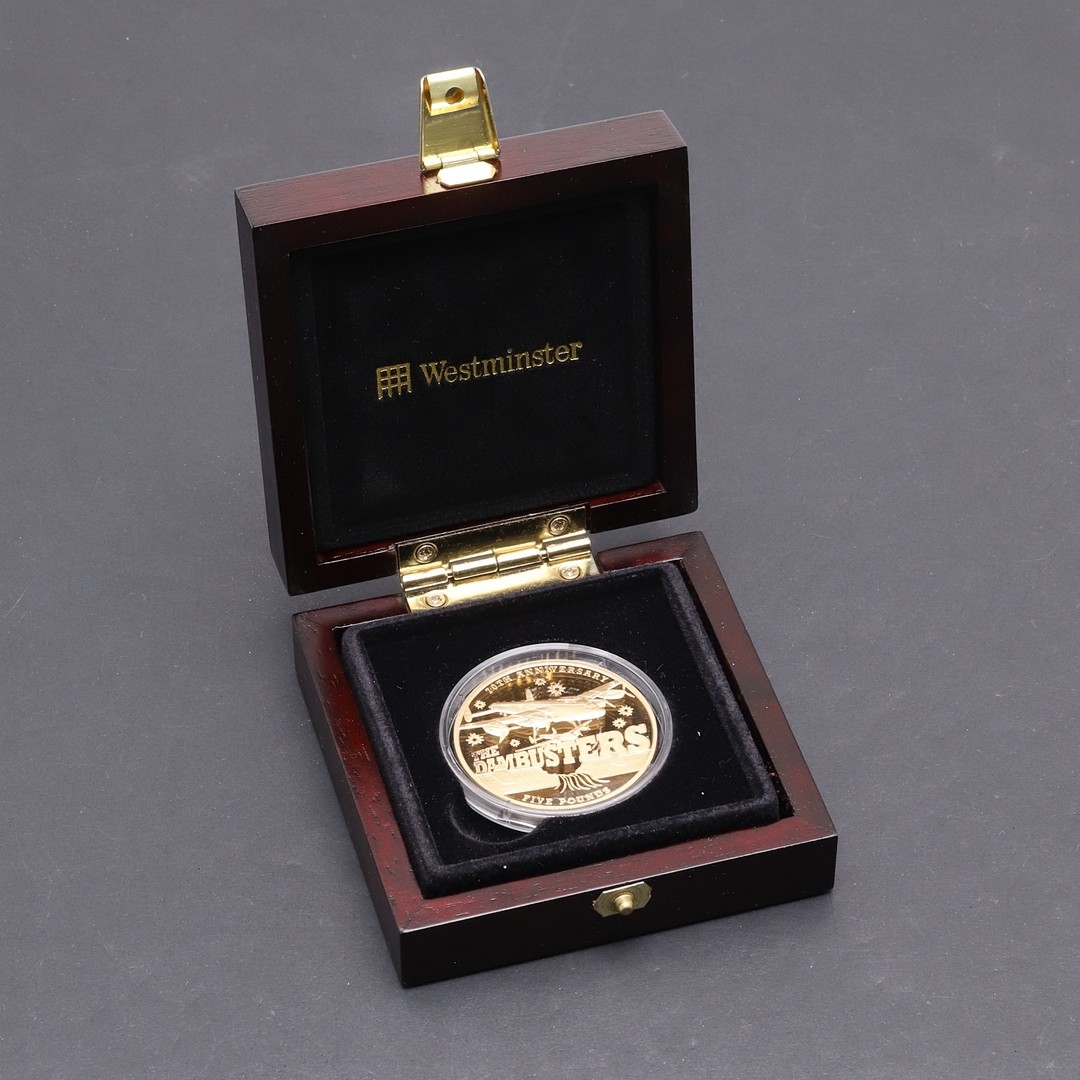 AN ELIZABETH II PROOF GOLD FIVE POUND 'DAMBUSTERS' COIN, 2013. An ...