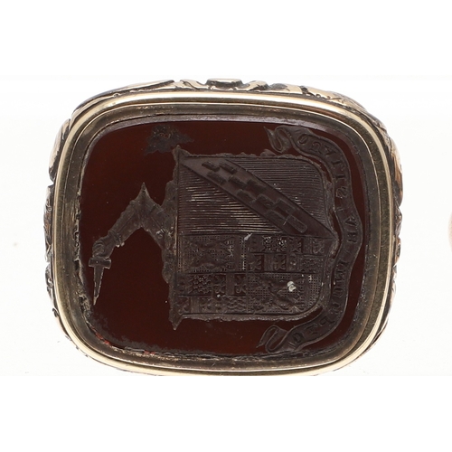 120 - THREE 19TH C. GOLD FOB SEALS. each with hardstone armorial intaglio and one with floral decoration.