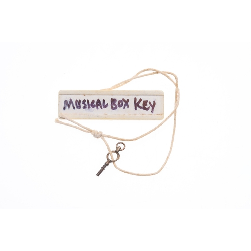 122 - A SWISS GOLD SNUFF BOX WITH MUSICAL MOVEMENT. Rectangular with rounded corners and engine turned dec... 