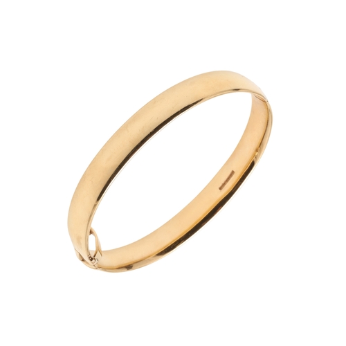 154 - A 9CT GOLD HALF HINGED BANGLE. of plain form, internal measurements 5.3cm x 6.5cm., 40.8 grams.