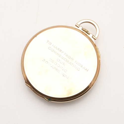 167 - A 9CT GOLD OPEN FACED POCKET WATCH. the circular gold coloured dial with Arabic numerals and subsidi... 