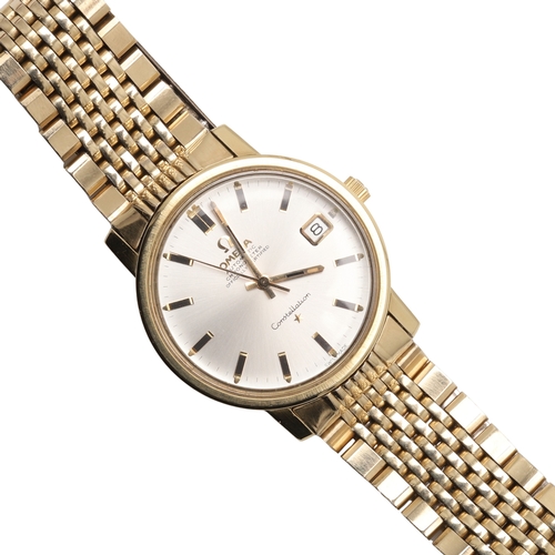 181 - A GENTLEMAN'S STAINLESS STEEL AND GOLD PLATED AUTOMATIC CONSTELLATION WRISTWATCH BY OMEGA. the signe... 