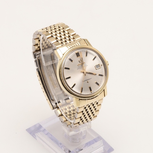 181 - A GENTLEMAN'S STAINLESS STEEL AND GOLD PLATED AUTOMATIC CONSTELLATION WRISTWATCH BY OMEGA. the signe... 