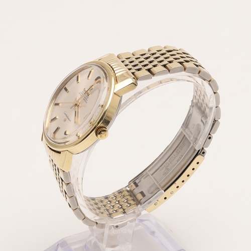 181 - A GENTLEMAN'S STAINLESS STEEL AND GOLD PLATED AUTOMATIC CONSTELLATION WRISTWATCH BY OMEGA. the signe... 