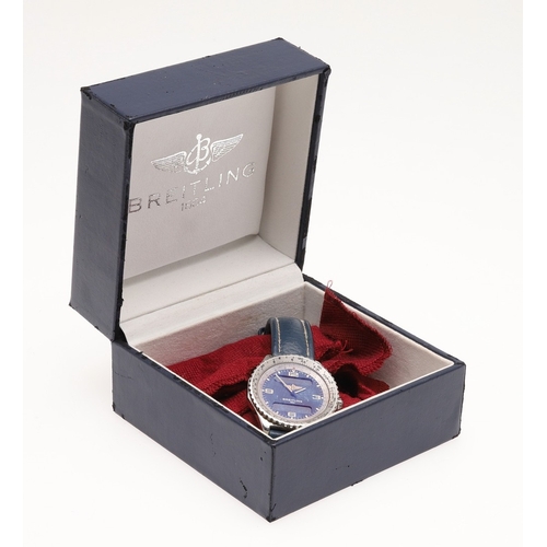 183 - A GENTLEMAN'S STAINLESS STEEL CHRONOSPACE WRISTWATCH BY BREITLING. the circular blue dial signed Bre... 