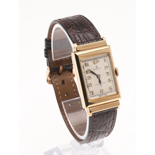 206 - A 9CT GOLD CHRONOMETER MECHANICAL WRISTWATCH BY ROLEX. the signed rectangular-shaped dial with Arabi... 