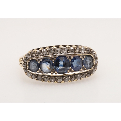 209 - A SAPPHIRE AND DIAMOND RING. the central row of graduated circular-cut sapphires is set within a sur... 