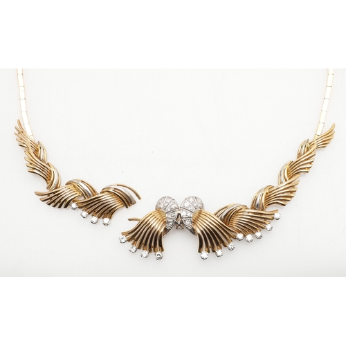 261 - A DIAMOND AND 18CT GOLD NECKLACE. mounted to the front with a scrolling design set with brilliant-cu... 