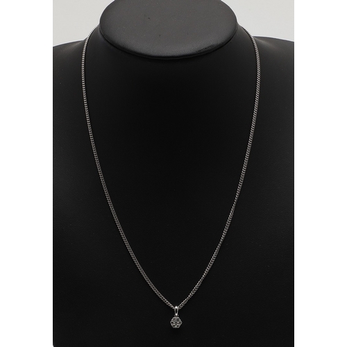 266 - A DIAMOND CLUSTER PENDANT. mounted with seven circular-cut diamonds, in 18ct white gold, on an 18ct ... 