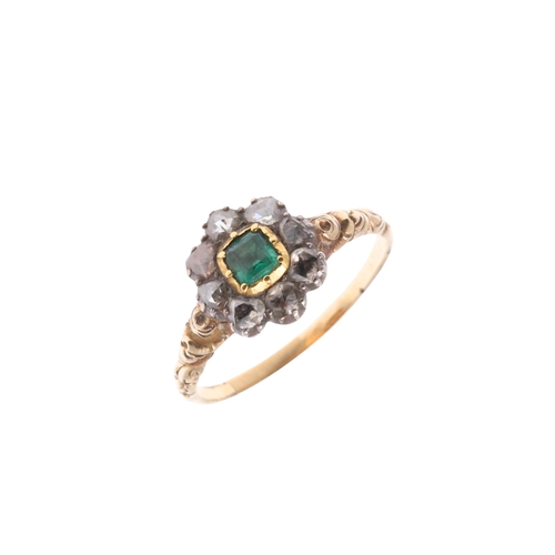 274 - A VICTORIAN COLOMBIAN EMERALD AND DIAMOND CLUSTER RING. the square-shaped emerald is set within a su... 