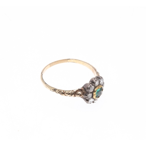 274 - A VICTORIAN COLOMBIAN EMERALD AND DIAMOND CLUSTER RING. the square-shaped emerald is set within a su... 