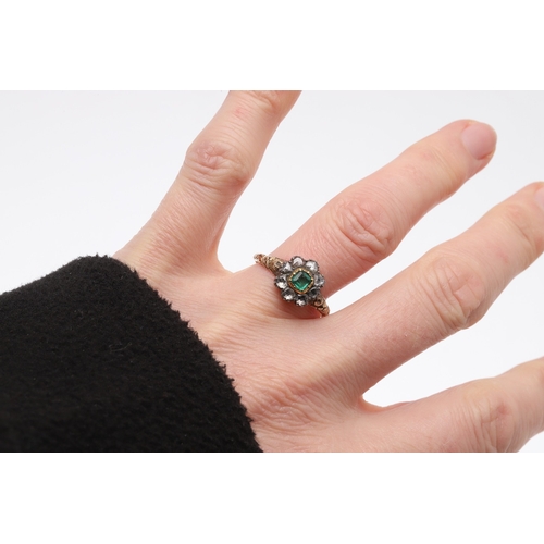 274 - A VICTORIAN COLOMBIAN EMERALD AND DIAMOND CLUSTER RING. the square-shaped emerald is set within a su... 