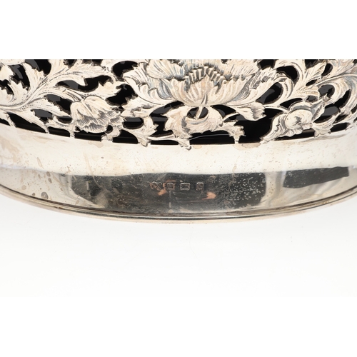 28 - AN EDWARDIAN SILVER FRUIT BOWL. Of nevette form, the sides decorated with pierced foliate and floral... 