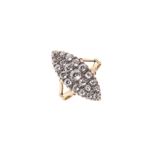 290 - A DIAMOND MARQUISE-SHAPED CLUSTER RING. millegrain set with graduated round old-cut diamonds, in 18c... 