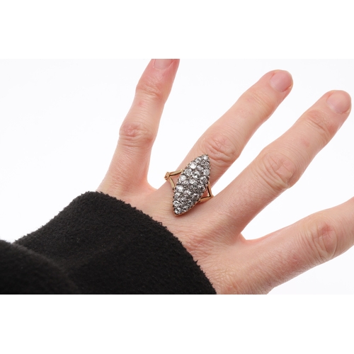 290 - A DIAMOND MARQUISE-SHAPED CLUSTER RING. millegrain set with graduated round old-cut diamonds, in 18c... 