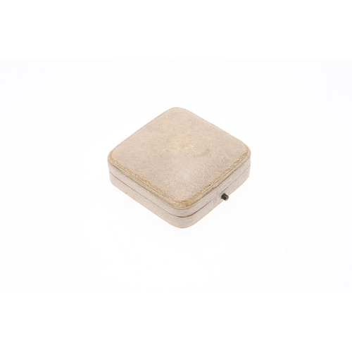 294 - AN EARLY 20TH CENTURY FRENCH SAPPHIRE AND DIAMOND BROOCH. the scrolling openwork mount is centred wi... 